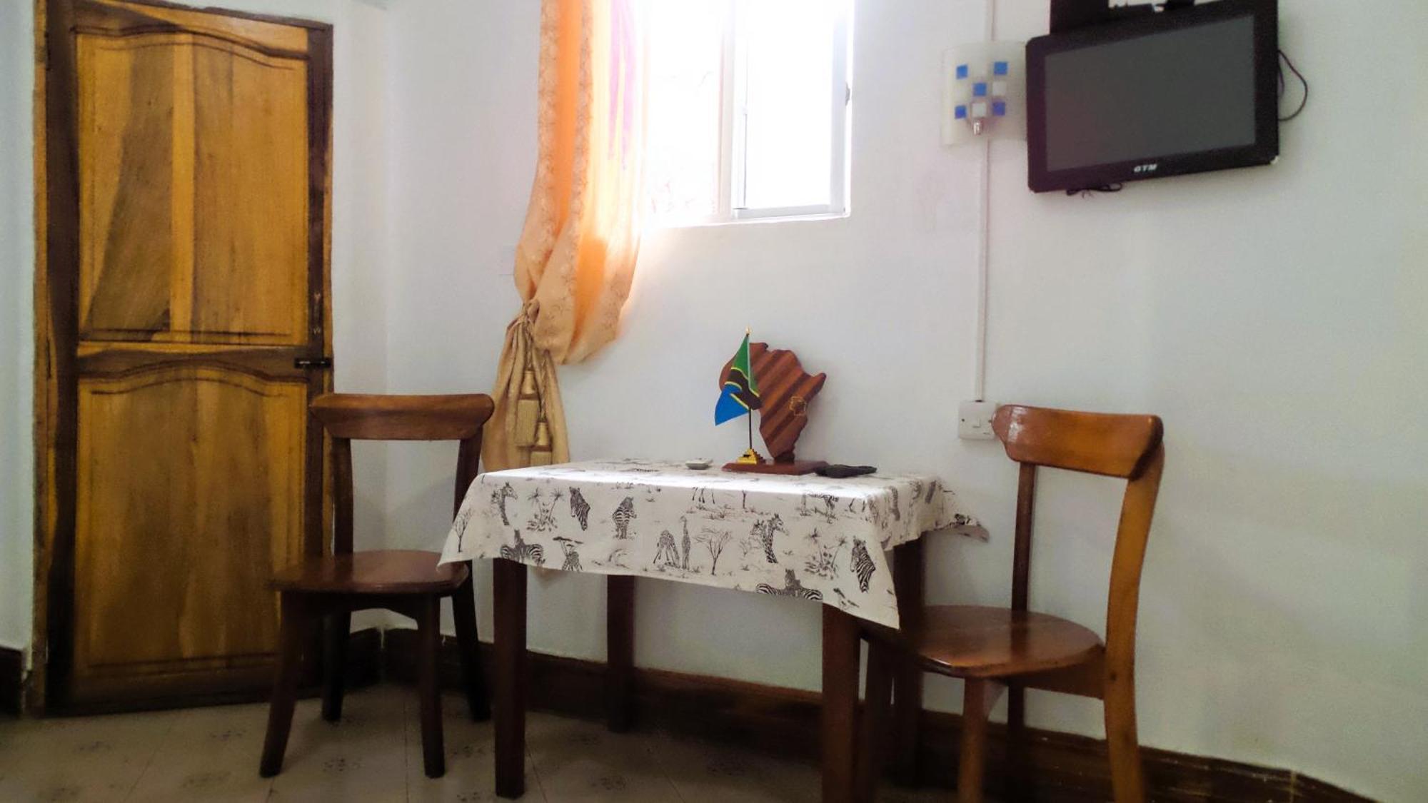 Home Feeling Neneu Lodge Moshi Exterior photo