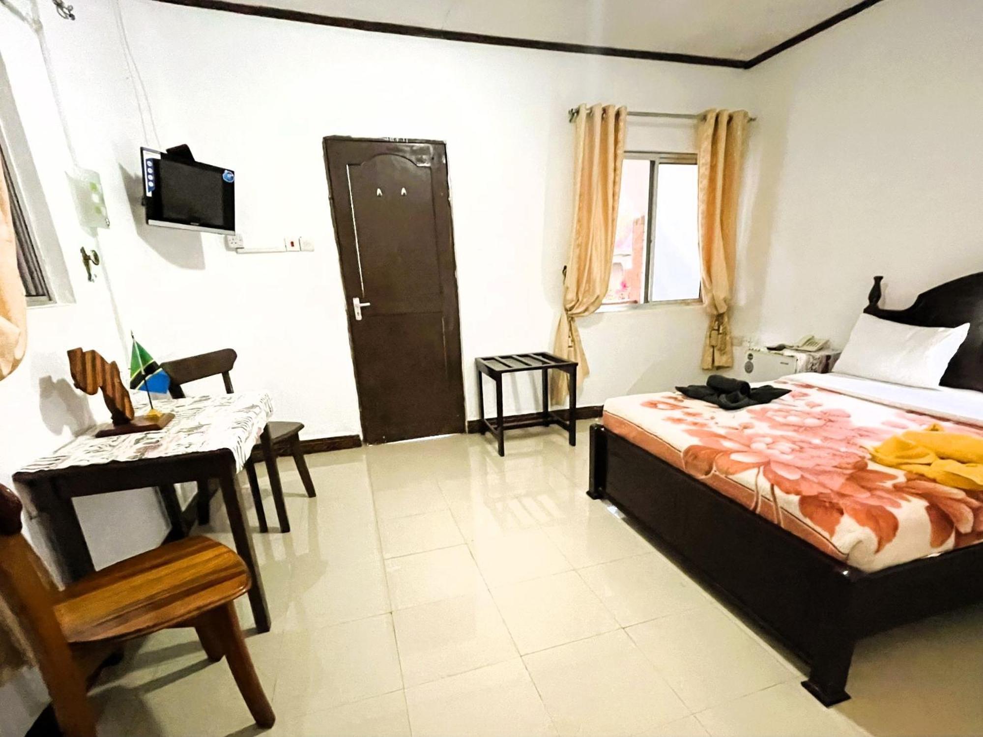 Home Feeling Neneu Lodge Moshi Exterior photo