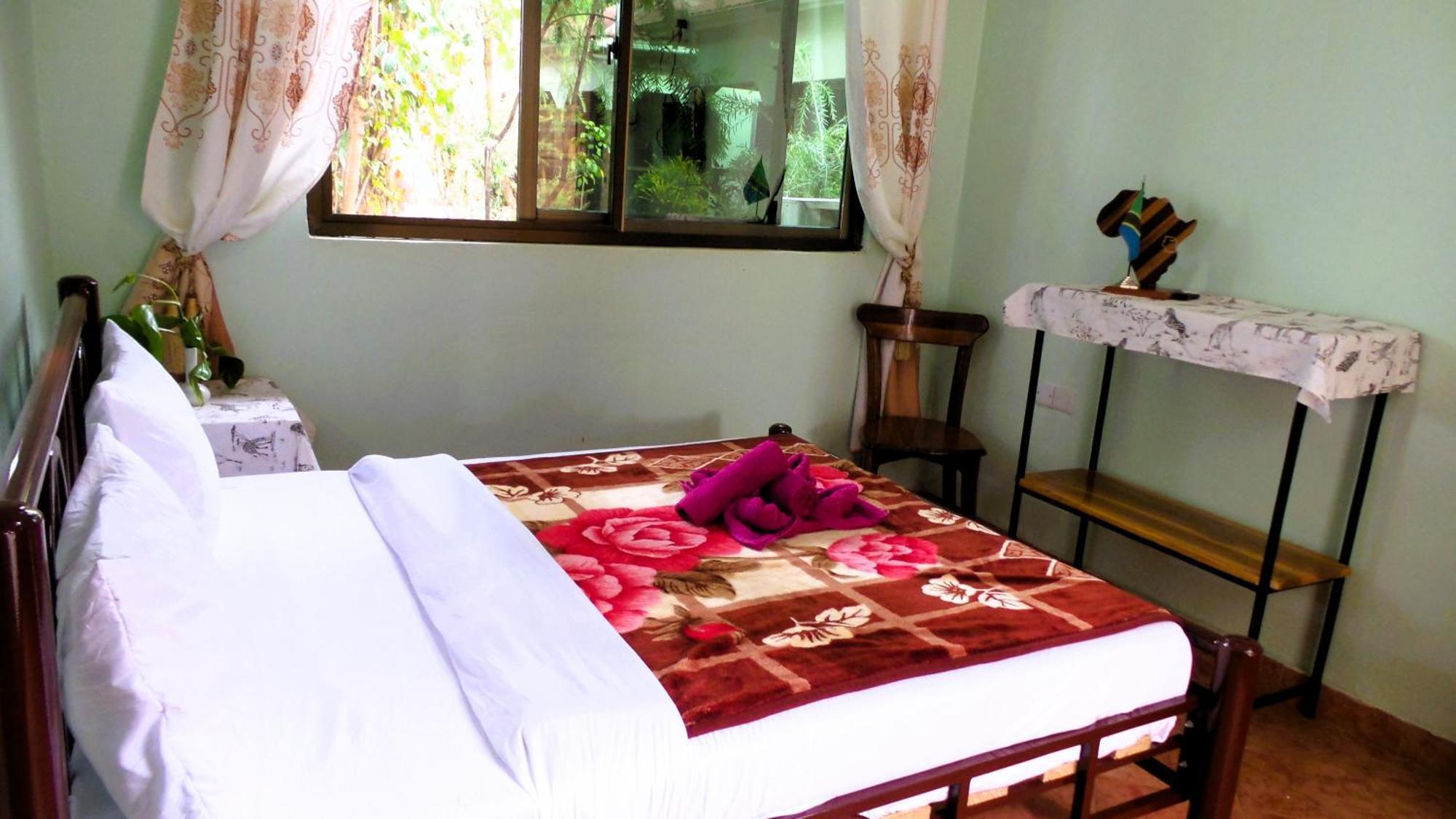 Home Feeling Neneu Lodge Moshi Exterior photo
