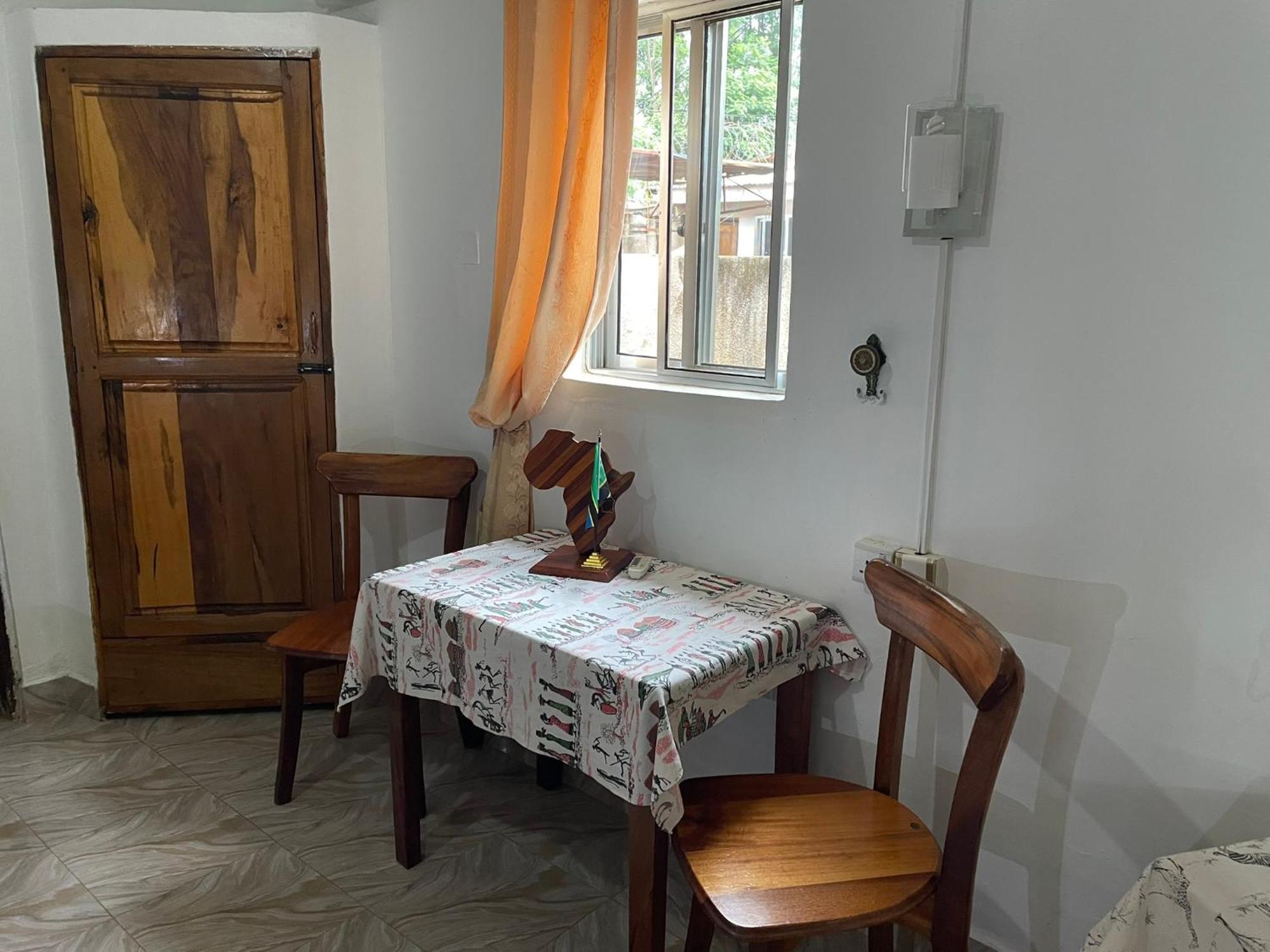 Home Feeling Neneu Lodge Moshi Exterior photo