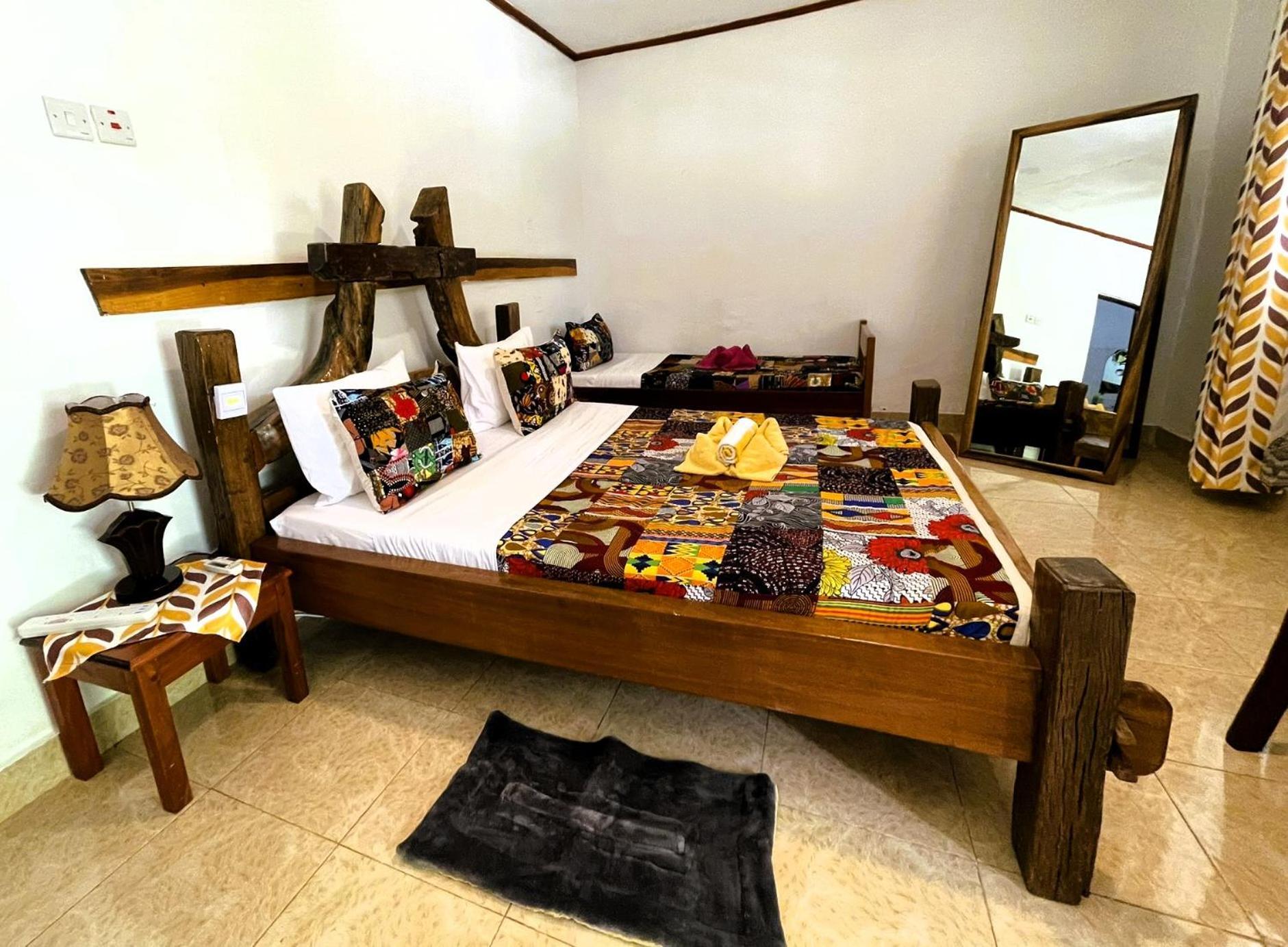 Home Feeling Neneu Lodge Moshi Exterior photo